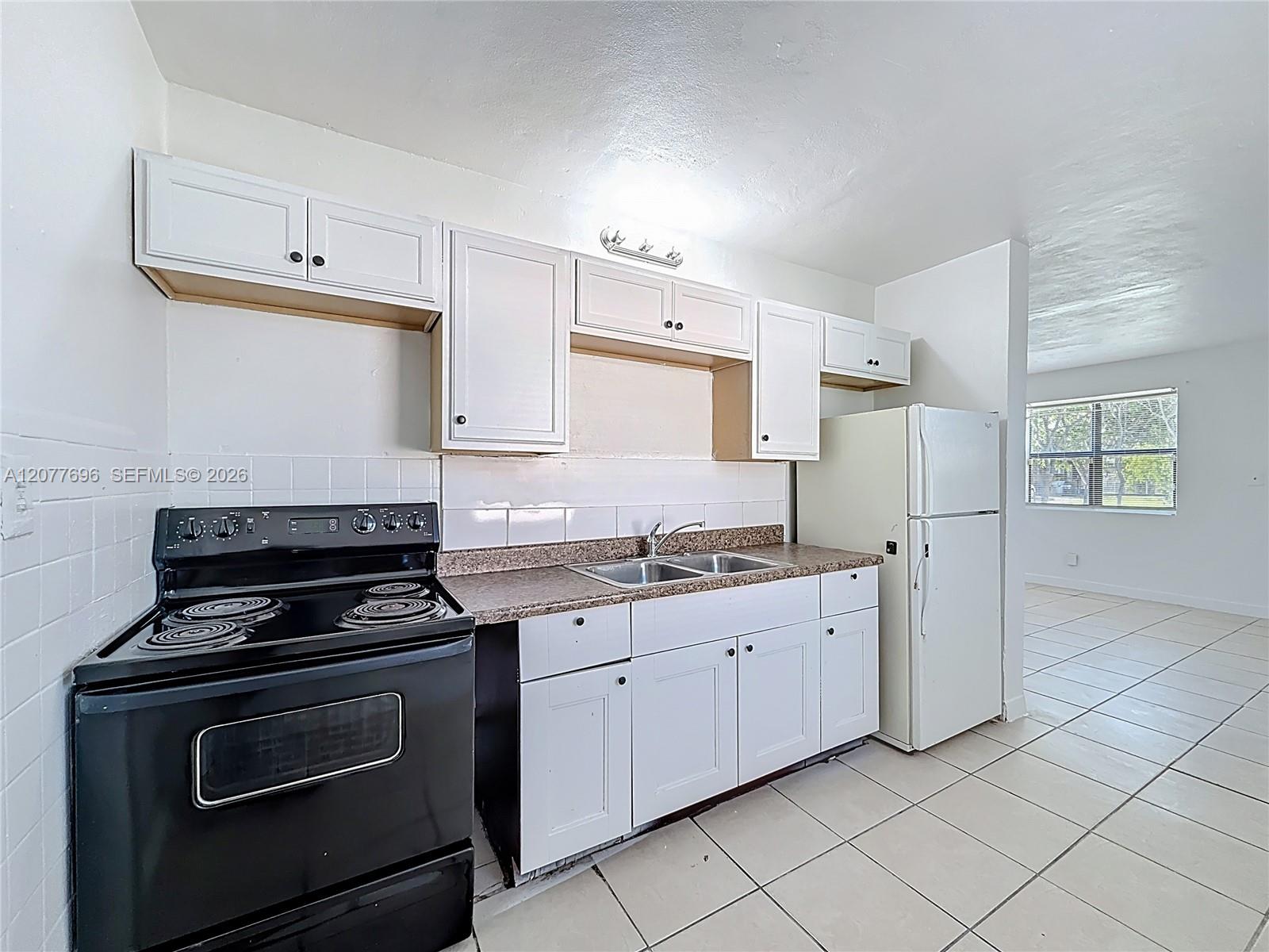 2419 NW 6th Ct — Photo 3