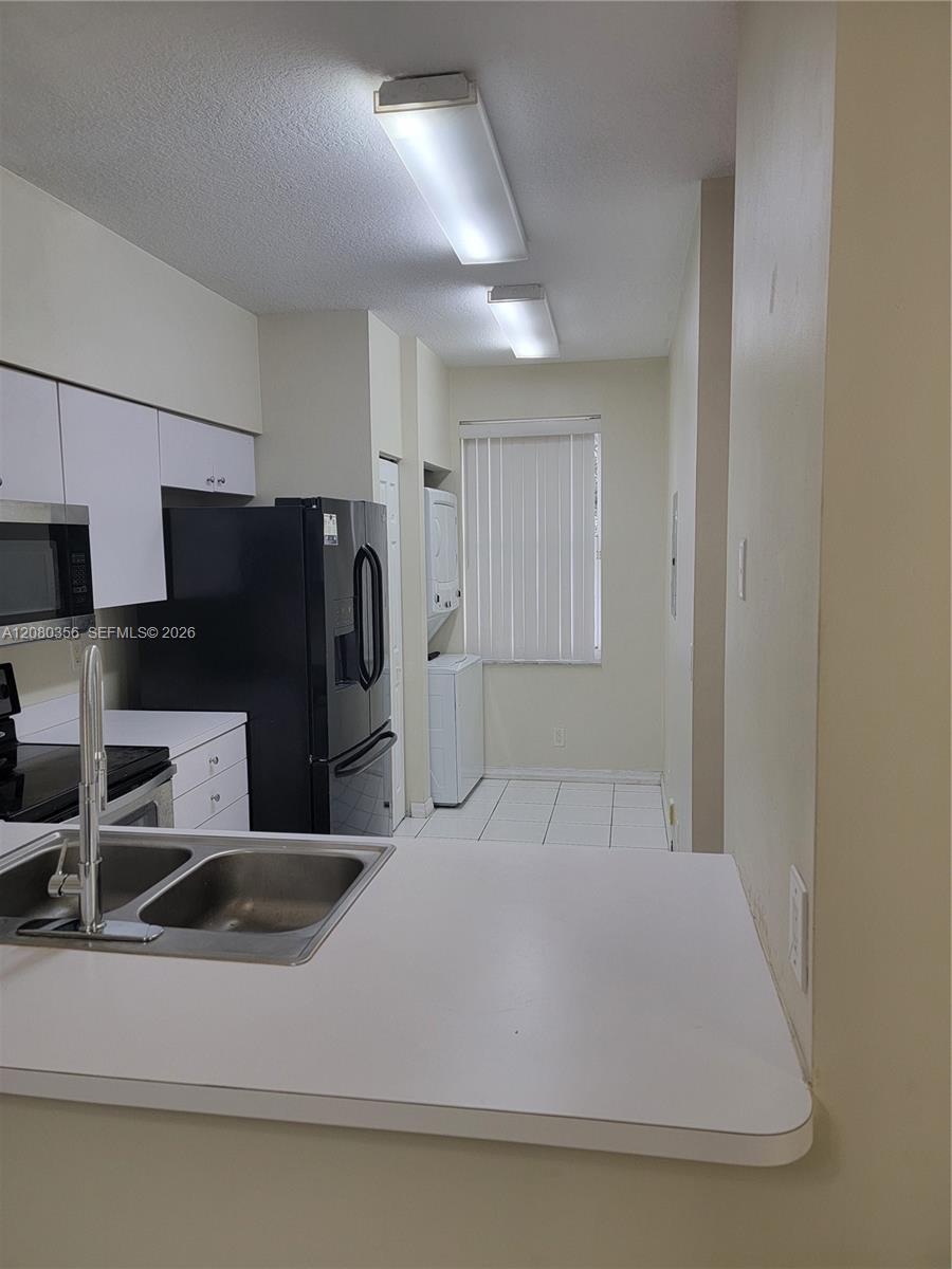835 NE 212th Ter # 5 — Photo 5