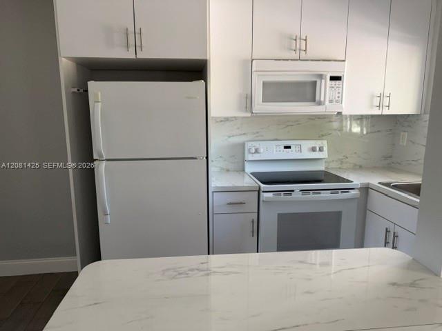 495 NW 43rd Ct # 6 — Photo 2