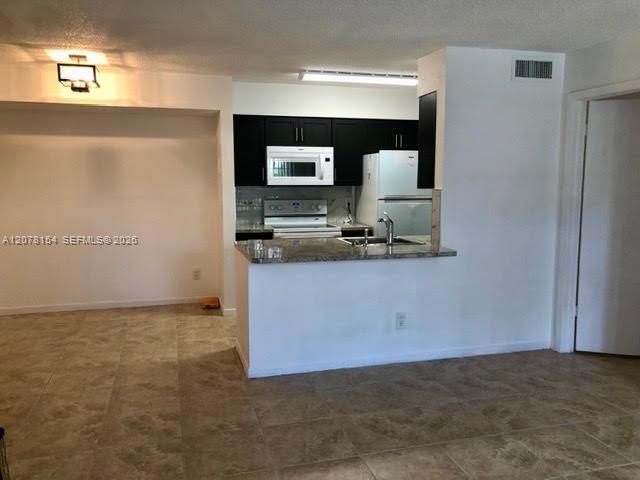 700 NW 103rd Ter # 101 — Photo 2