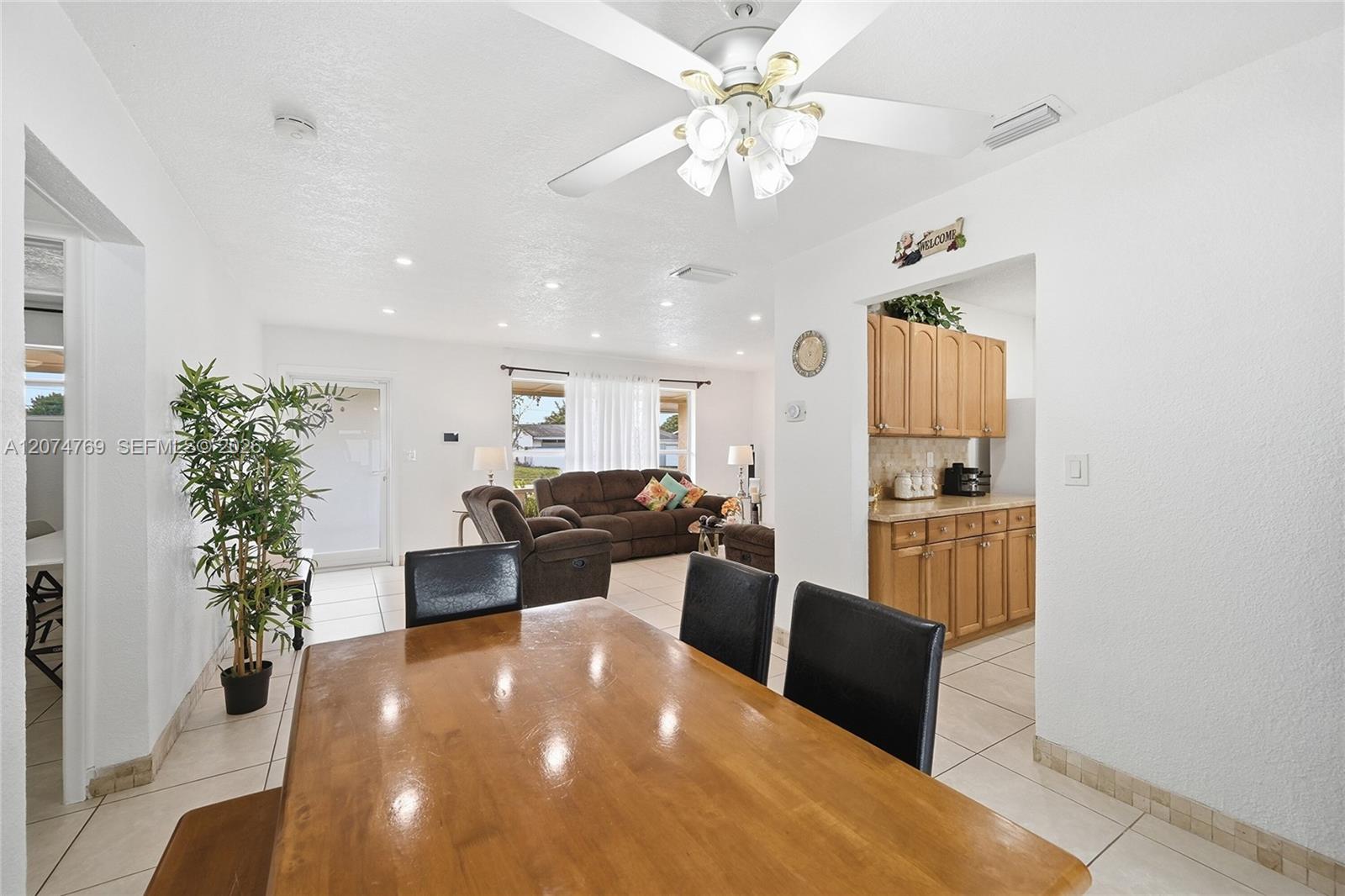 8641 NW 25th Ct — Photo 4