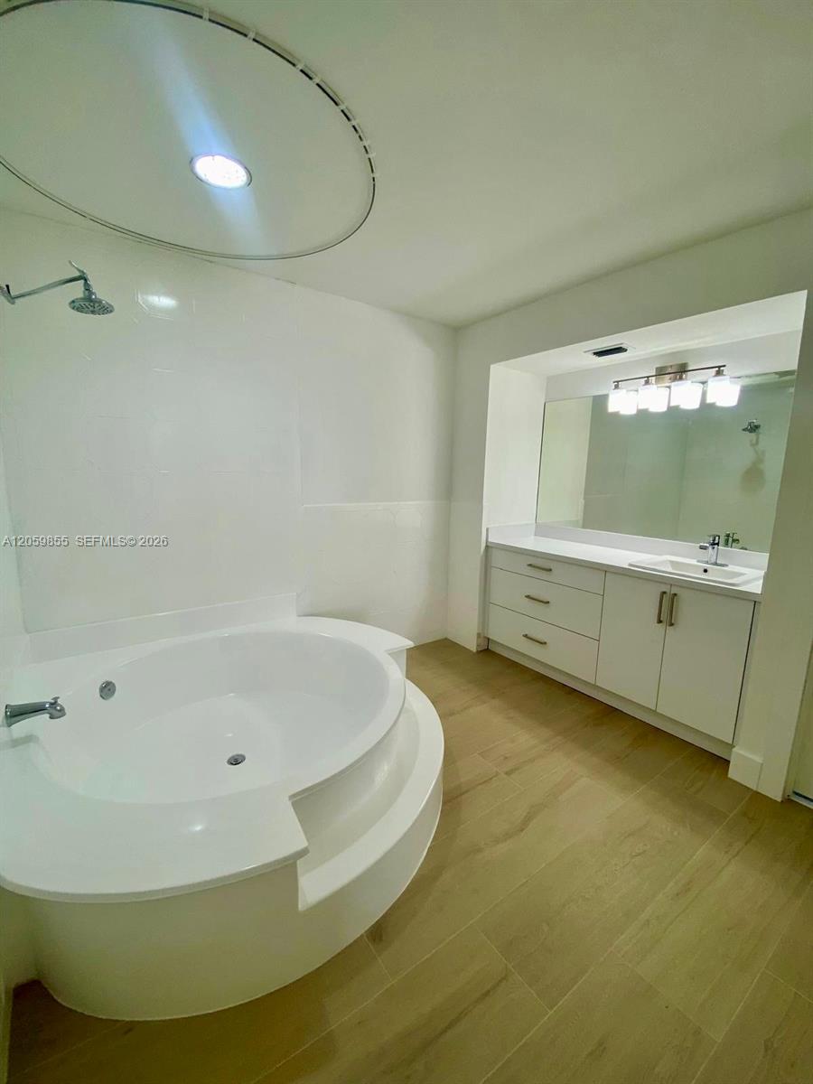 Master bathroom with tub