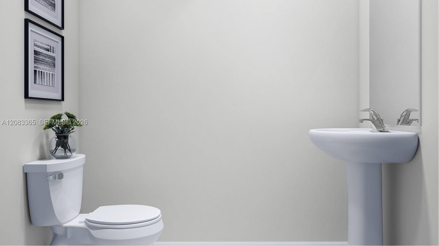 Located behind the family room is a convenient powder room to readily meet the needs of the whole household and visiting guests alike.