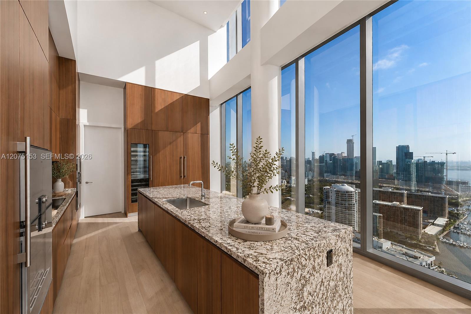 Kitchen. UNA Residences Brickell. One or more photos have been virtually staged.