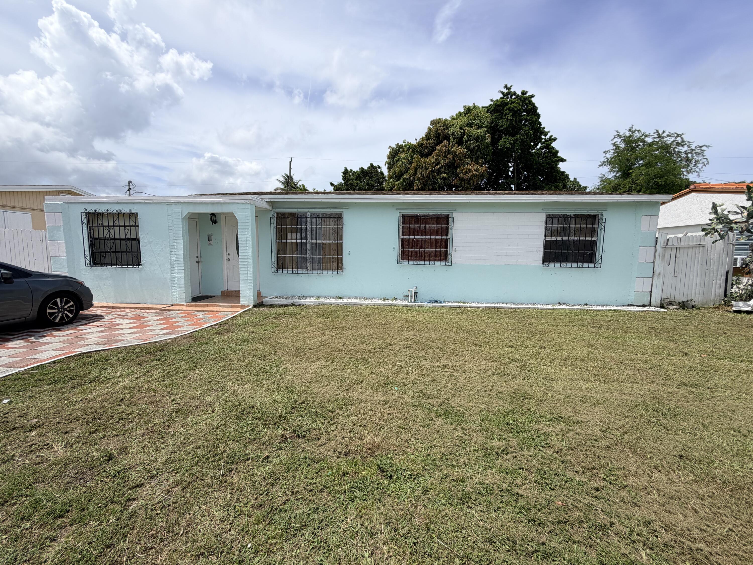 2033 Longwood Road, West Palm Beach FL 33409