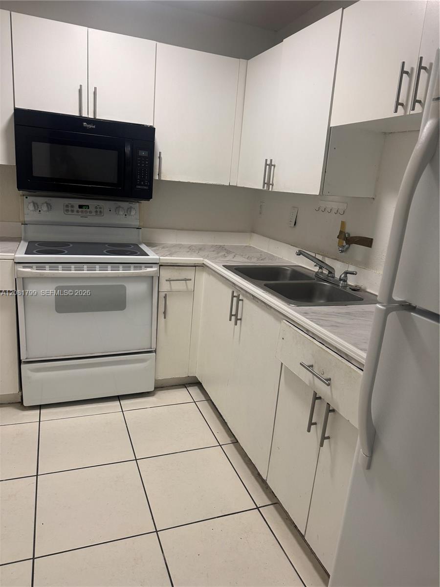 5755 W 20th Ave # 201 — Photo 4