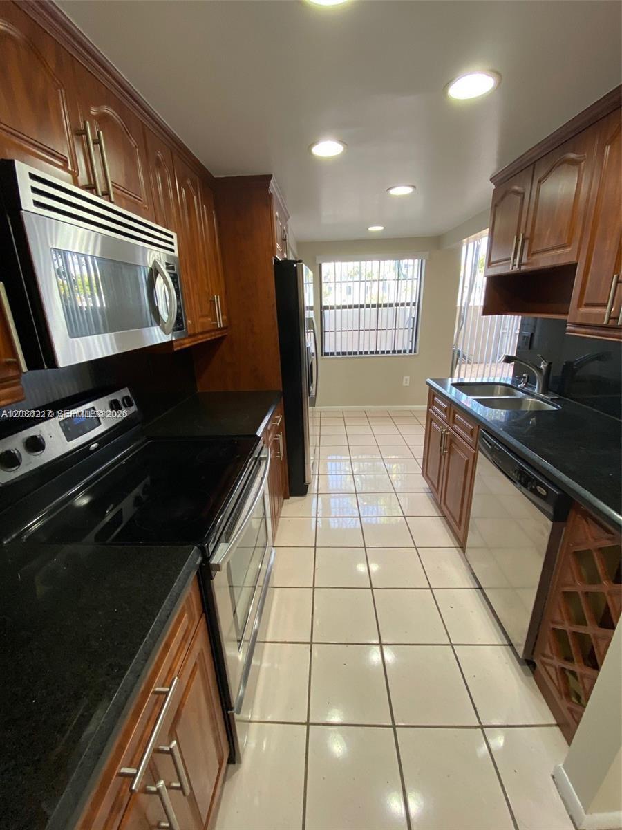 12241 SW 16th Ter # K105 — Photo 5