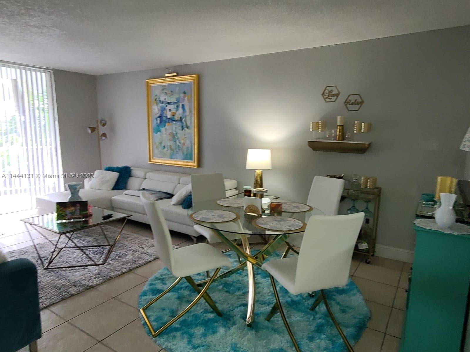 496 NW 165th St Rd # D112, Miami FL 33169