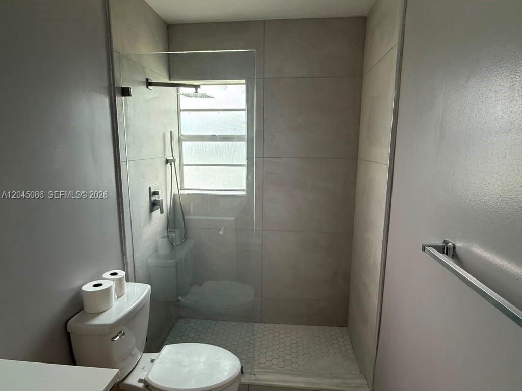 5870 NW 16th Pl # 4 — Photo 3