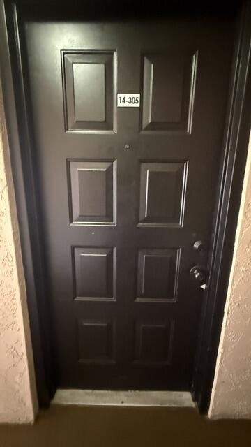 8741 Wiles Road # 305 — Photo 3
