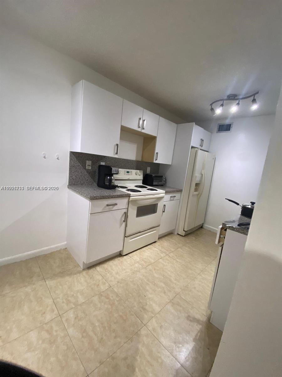 9761 NW 46th Ter # 107 — Photo 3