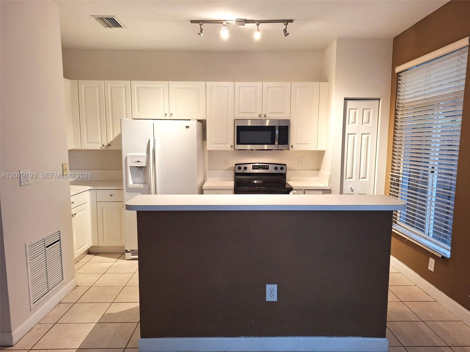 5770 NW 113th Pl # 0 — Photo 3