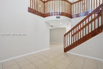 BEAUTIFUL WOOD STAIRCASE TO 2ND FLOOR