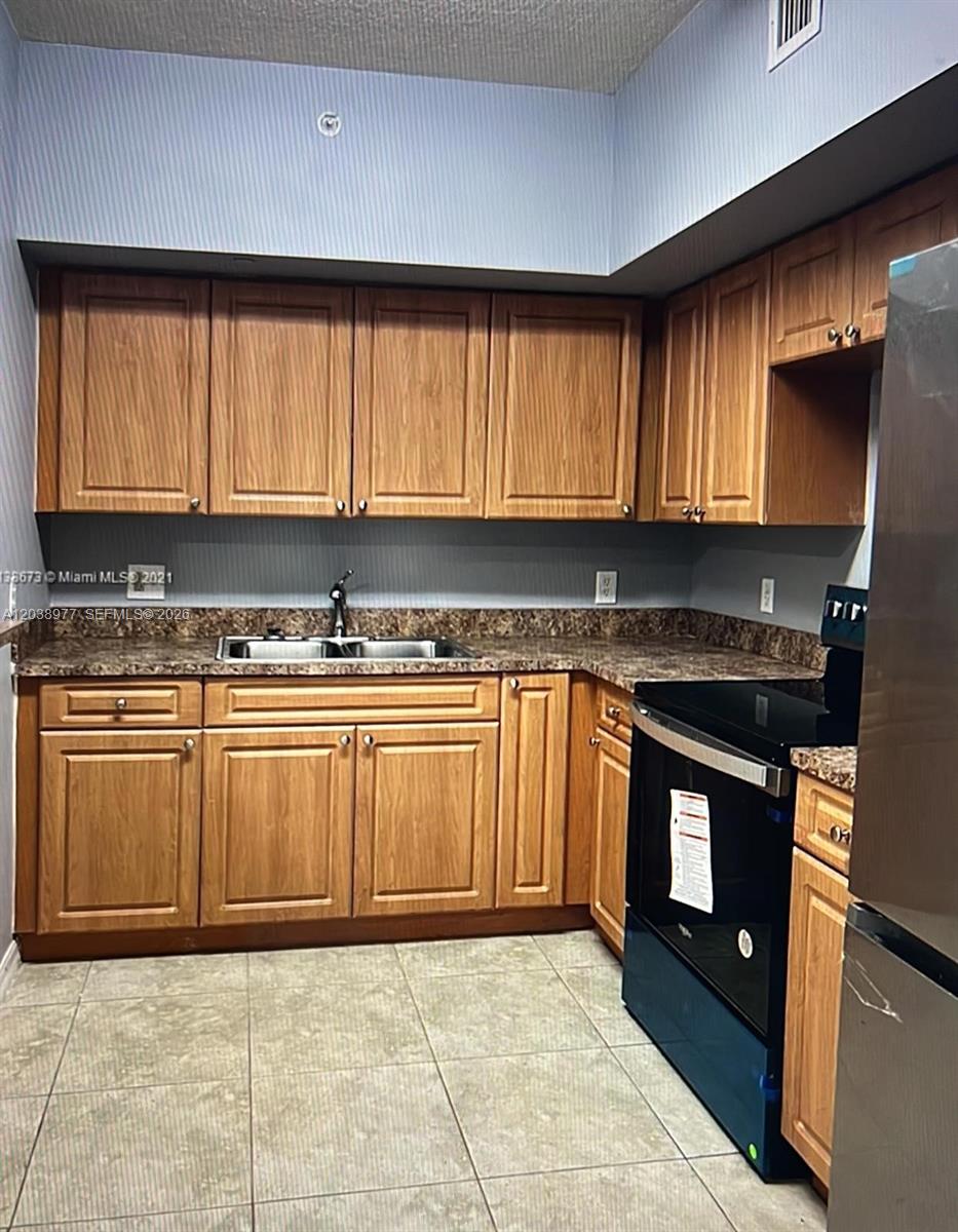 115 SW 42nd Ave # 206, Miami FL 33134