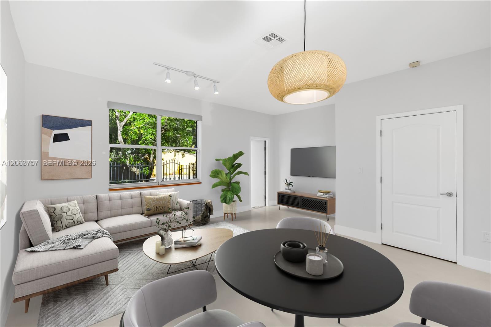 Living room and dining room virtually staged.