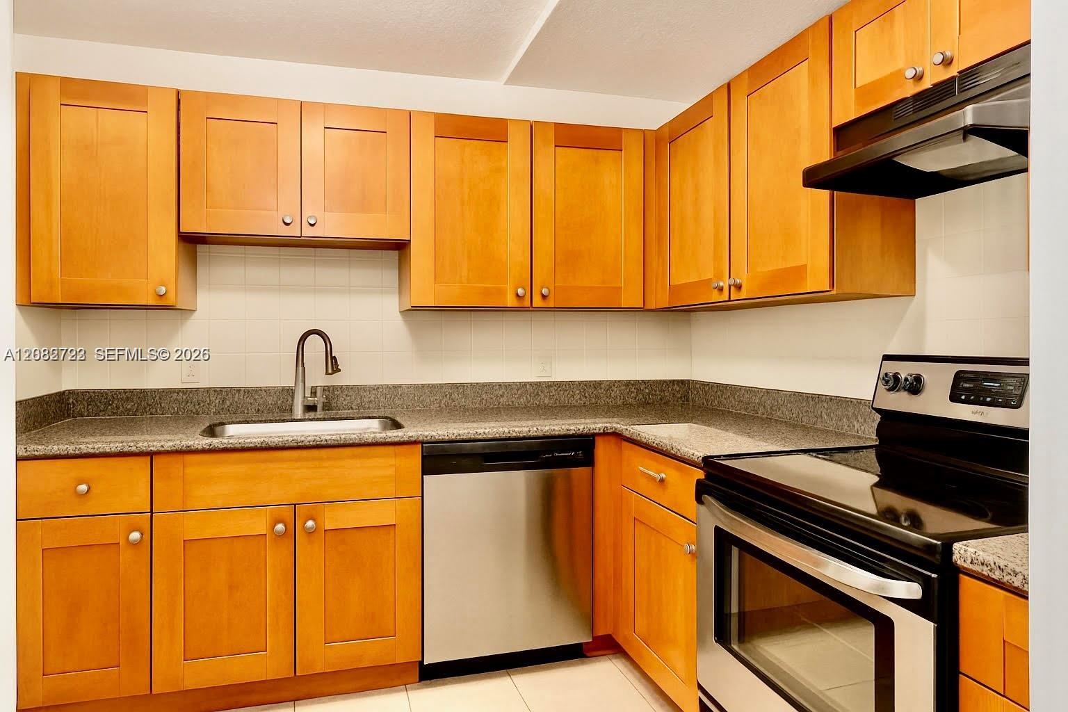 4848 NW 24th Ct # 203 — Photo 4