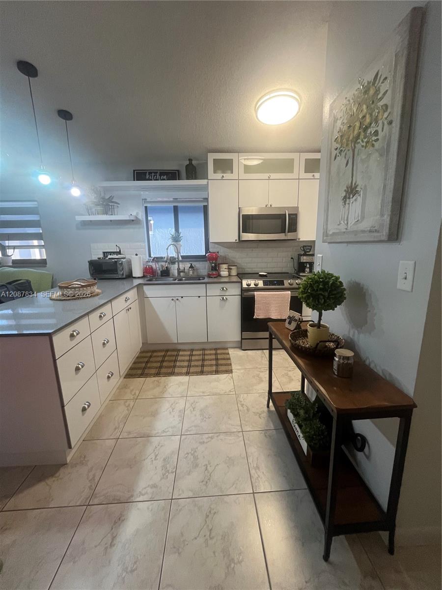 7801 W 30th Ln — Photo 5