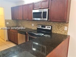 6979 SW 40th St # O — Photo 2