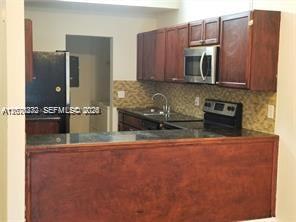 6979 SW 40th St # O — Photo 3