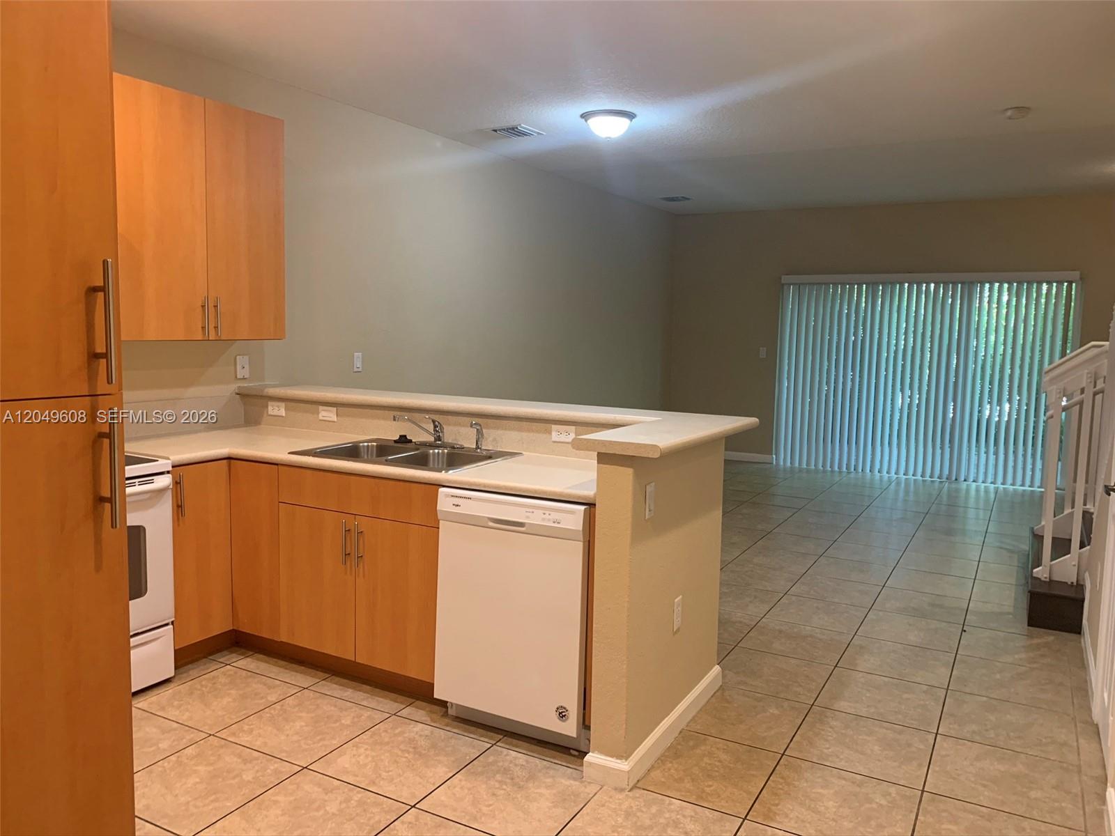 3102 NW 24th Way # 18 — Photo 2