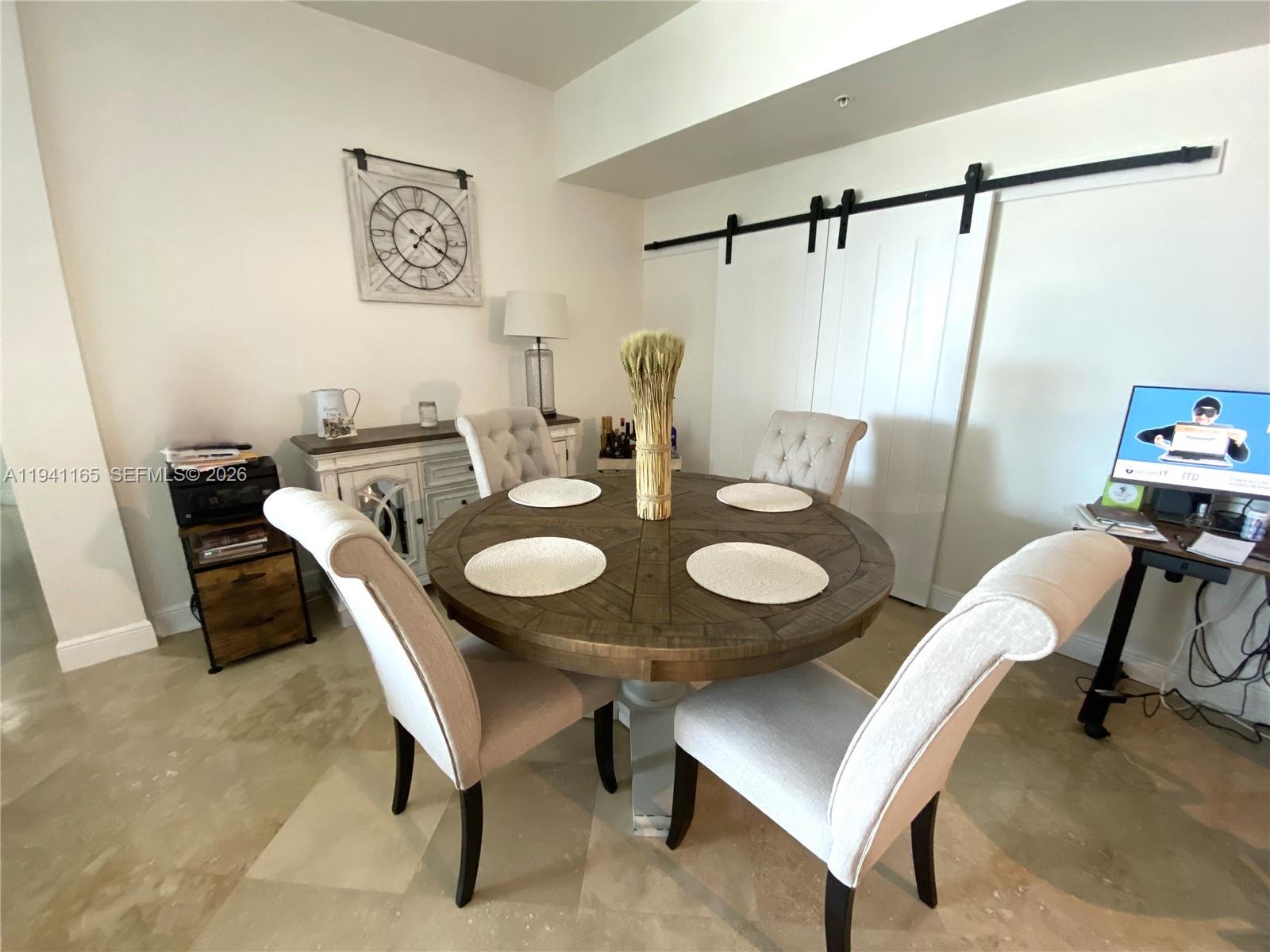 Den area being used as the dining area