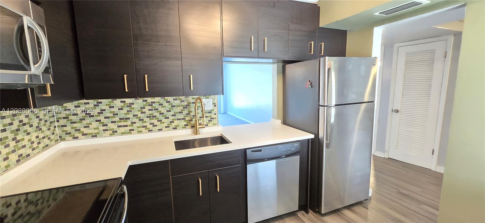 1201 NE 191st St # G306 — Photo 2