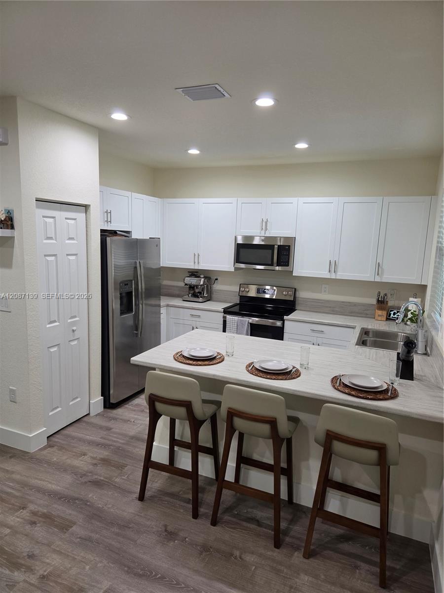 11079 W 32nd Ln — Photo 3
