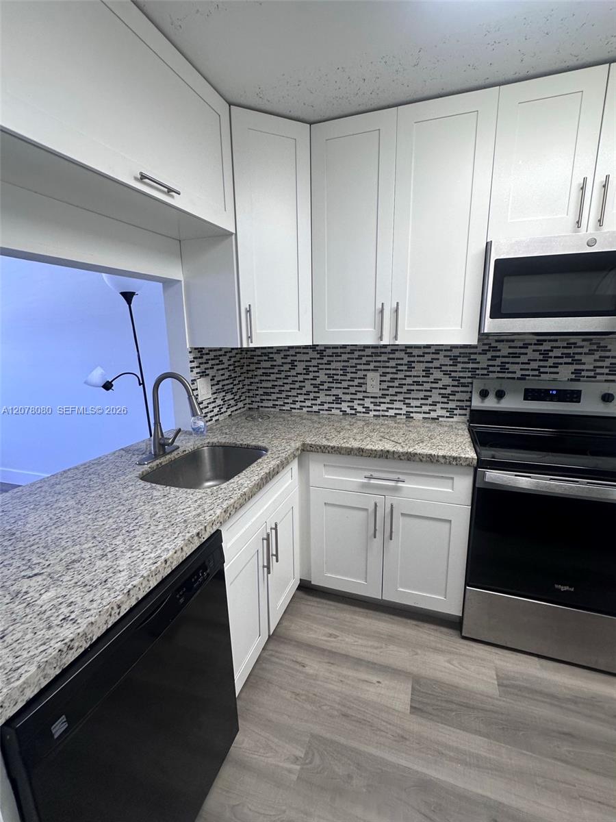 10049 Winding Lake Rd # 103 — Photo 3