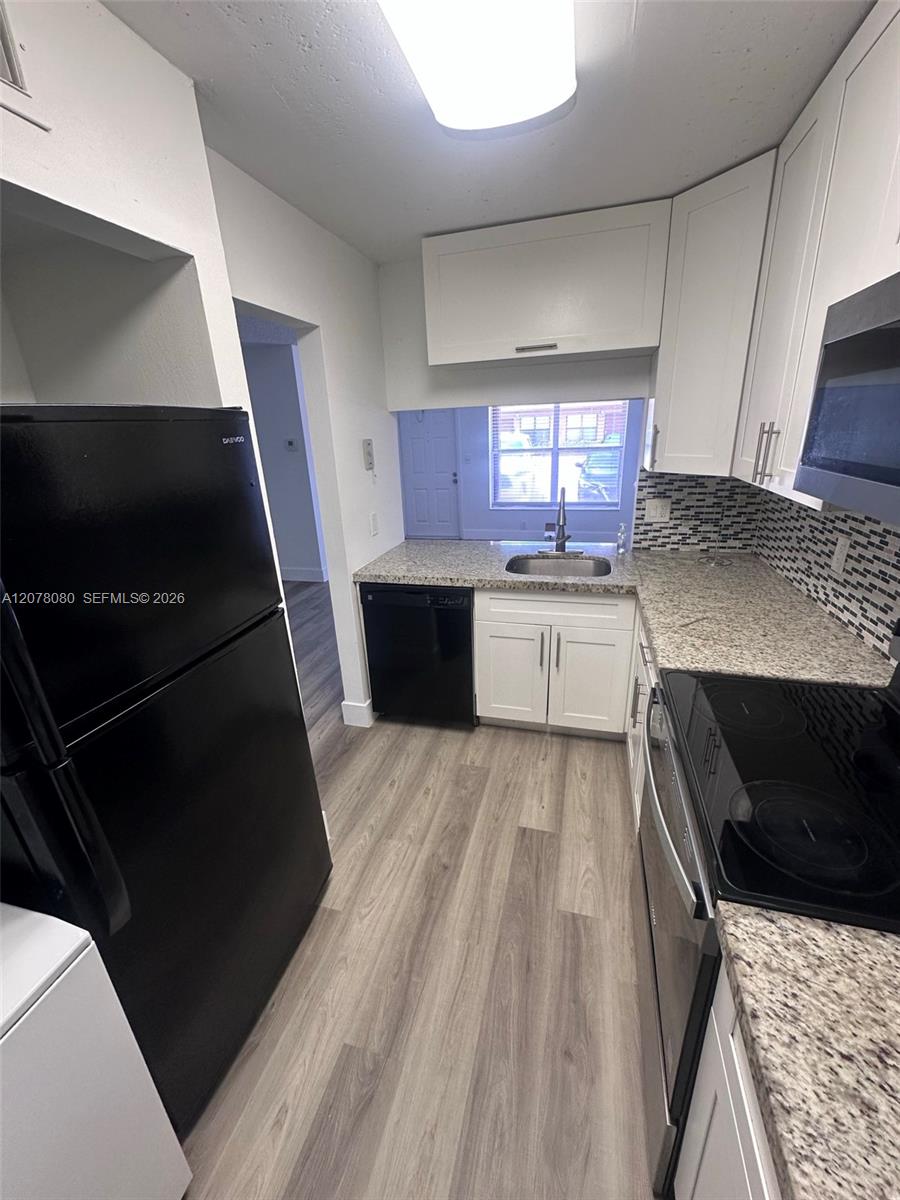 10049 Winding Lake Rd # 103 — Photo 4