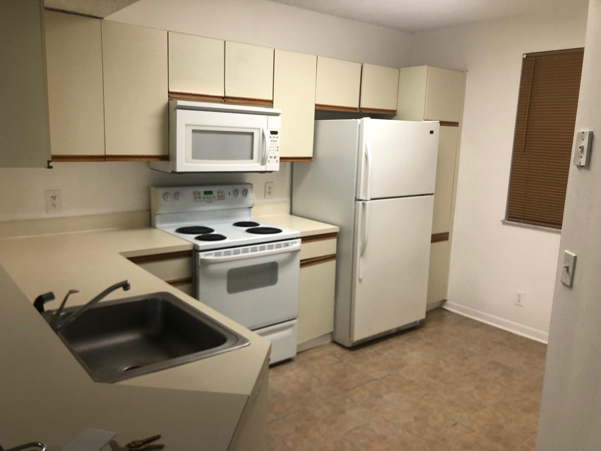8781 WILES Road # 201 — Photo 3