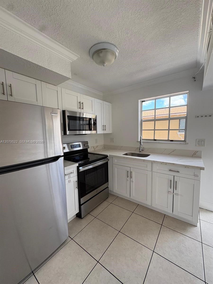 7510 SW 152nd Ave # C204 — Photo 5