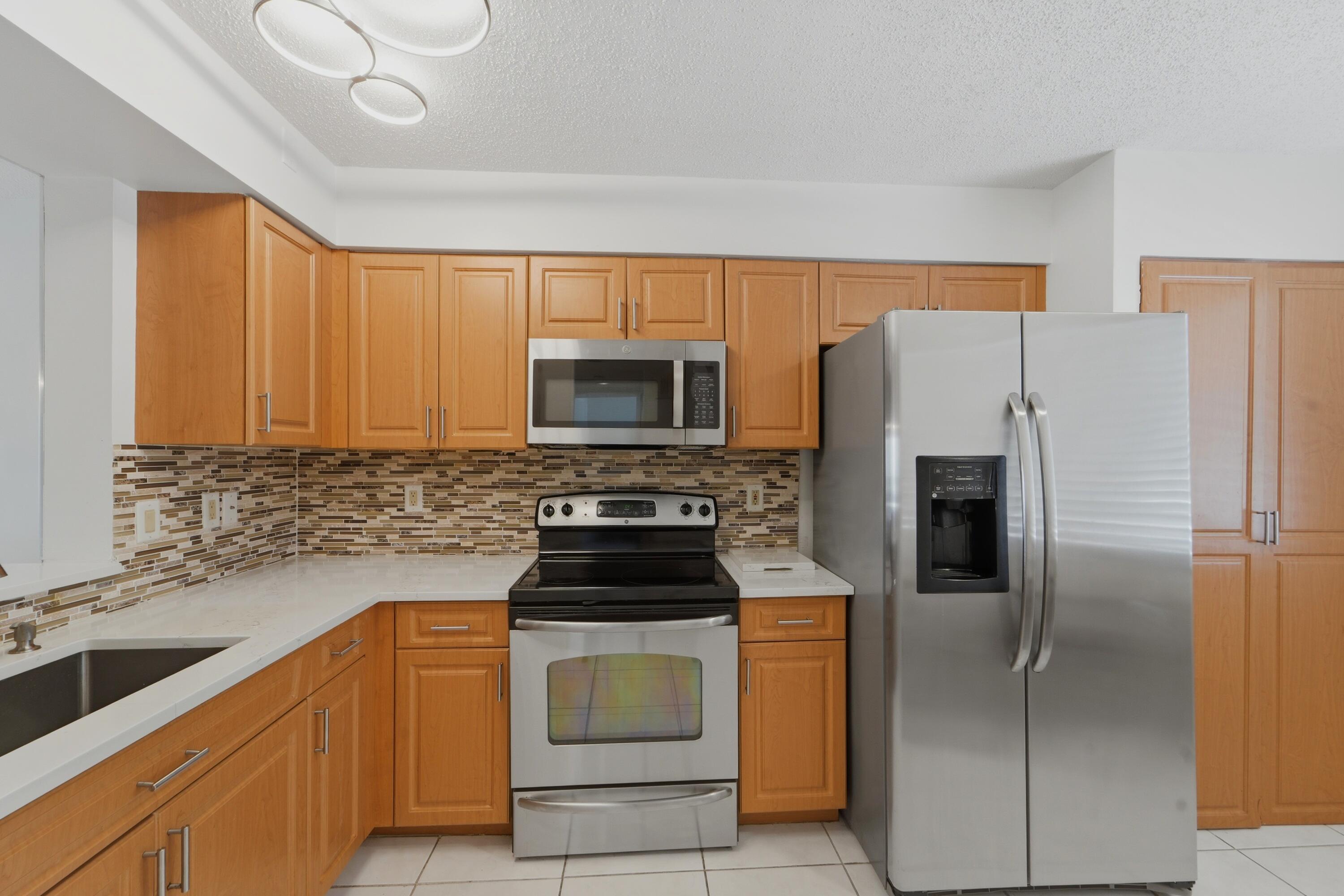 6093 POINTE REGAL Circle # 209 — Photo 2