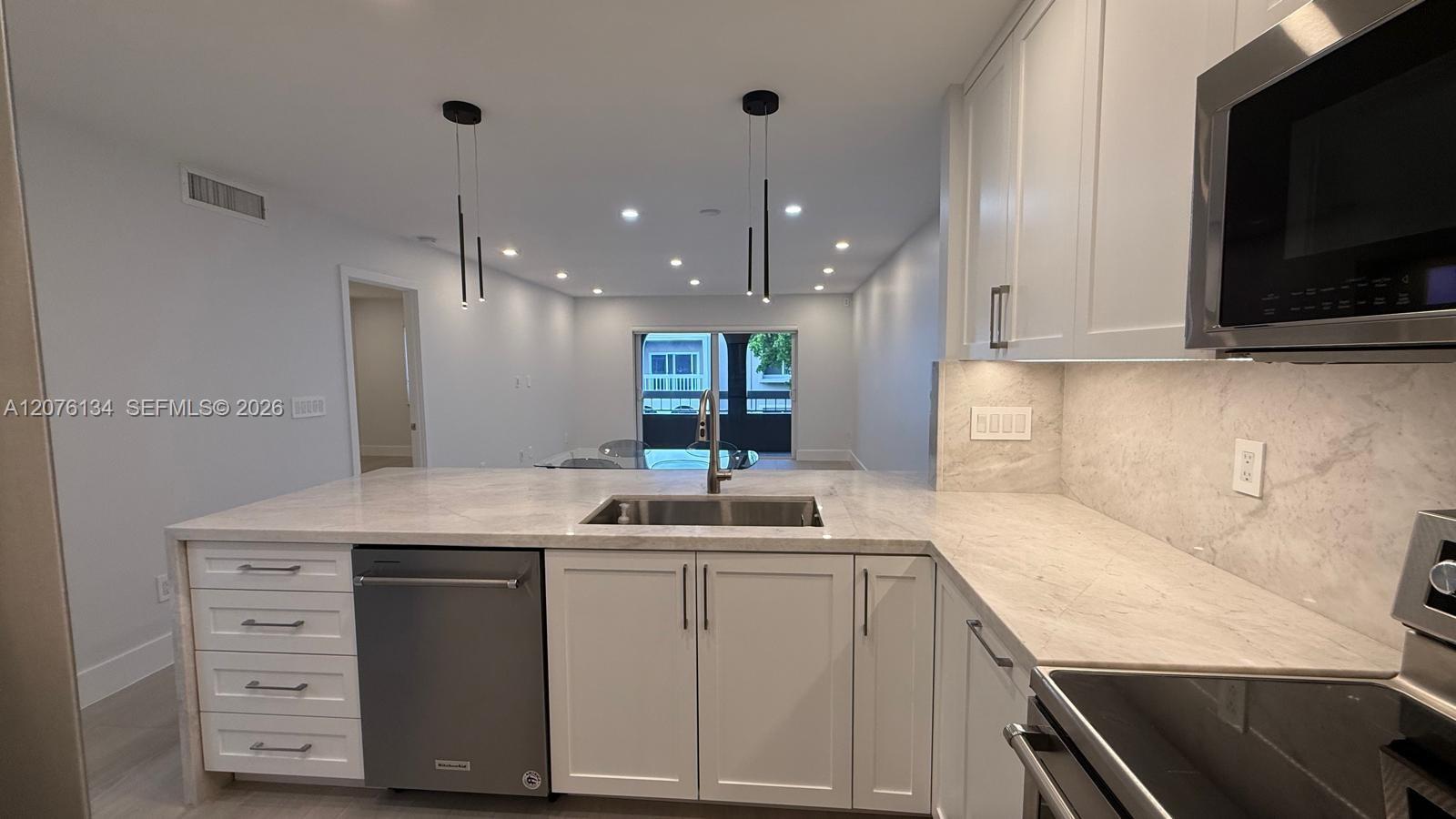 7840 Camino Real # 405 — Photo 4
