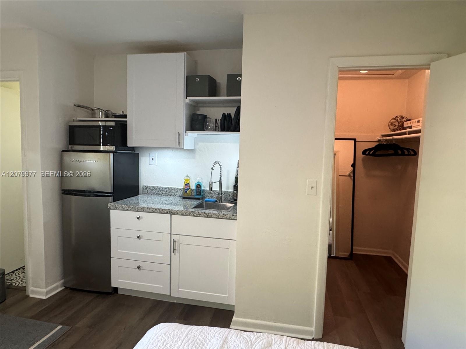 Left side door goes into the Full Bathroom with Shower and on the right side door is the walk in Closet