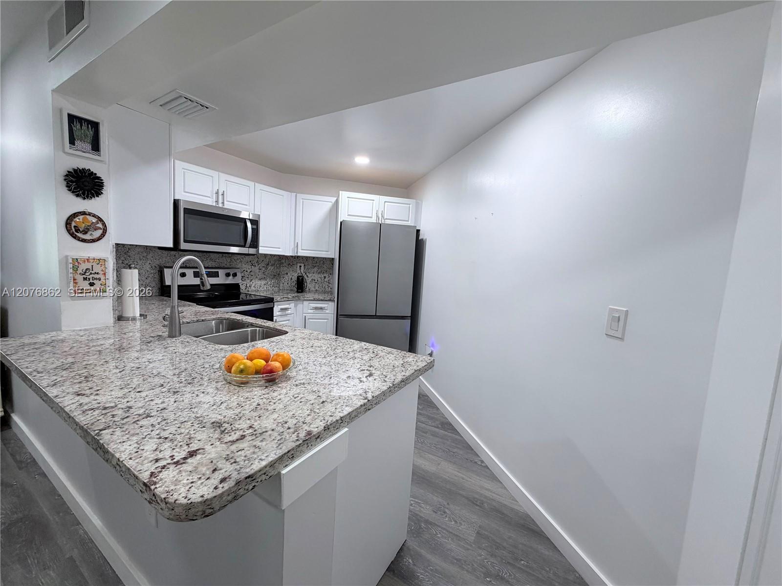 9731 Fontainebleau Blvd # F108 — Photo 2