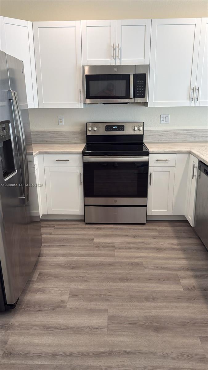 10948 W 32nd Ln — Photo 5