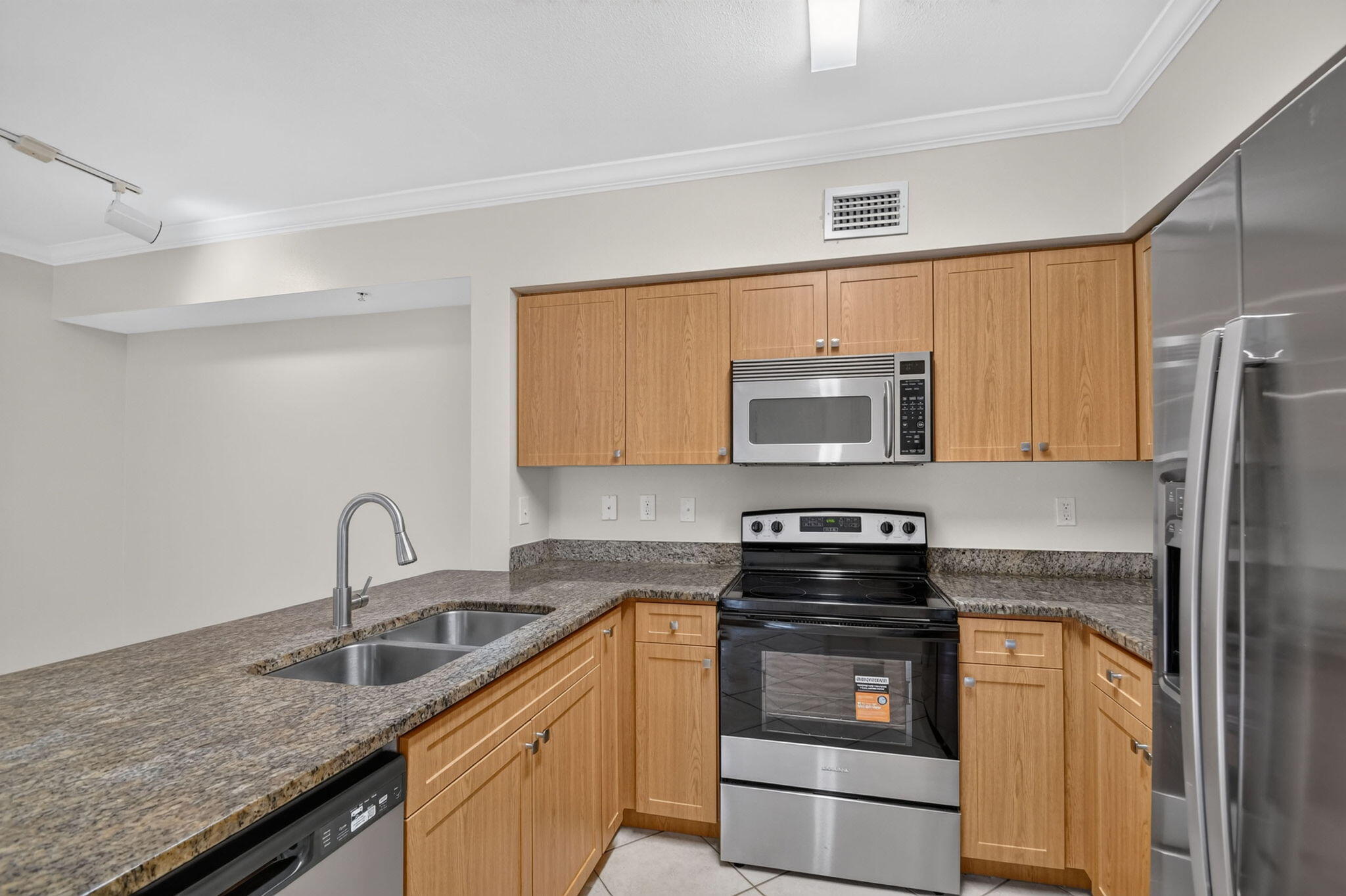 6370 EMERALD DUNES Drive # 203 — Photo 2