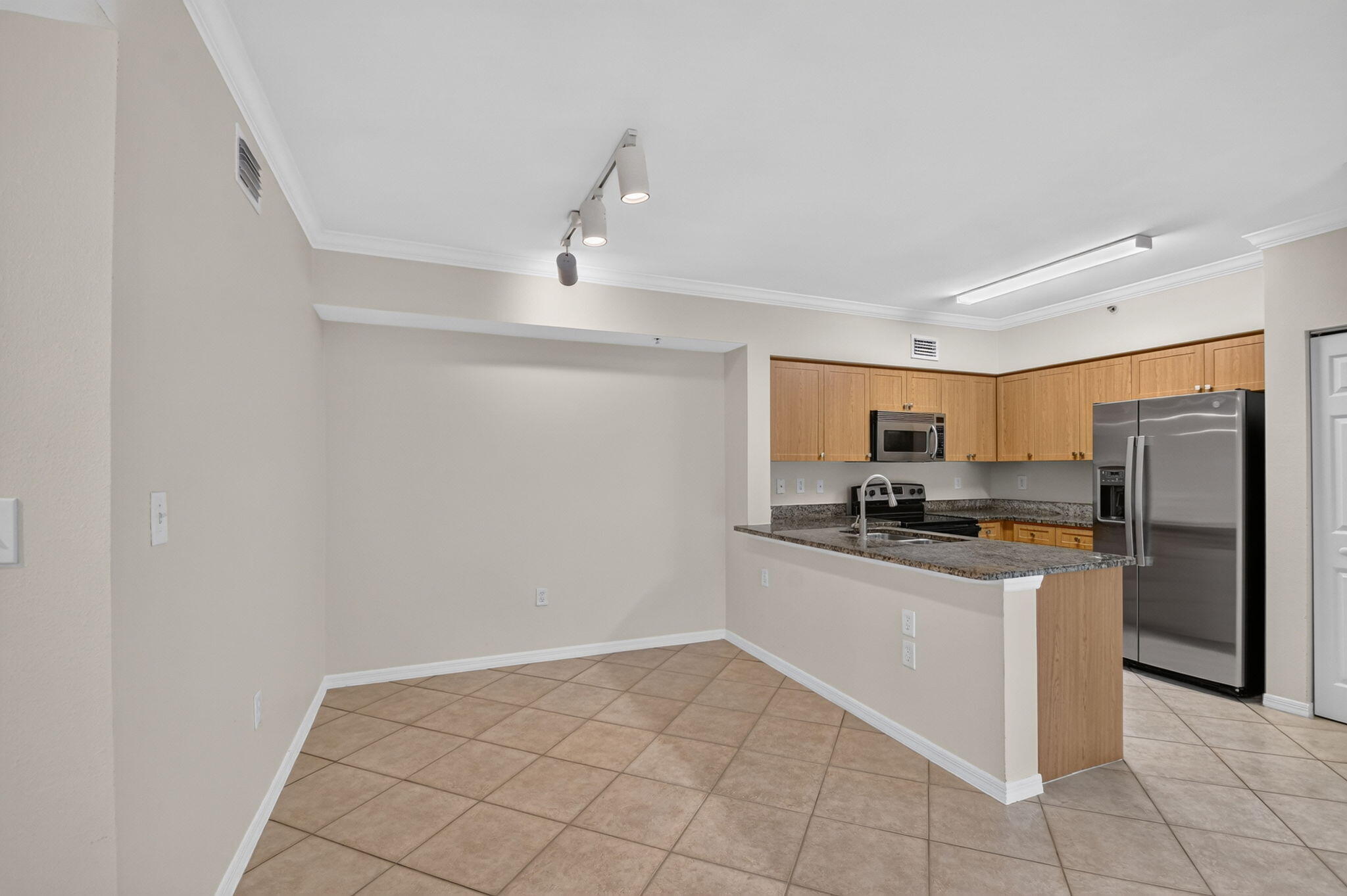 6370 EMERALD DUNES Drive # 203 — Photo 3
