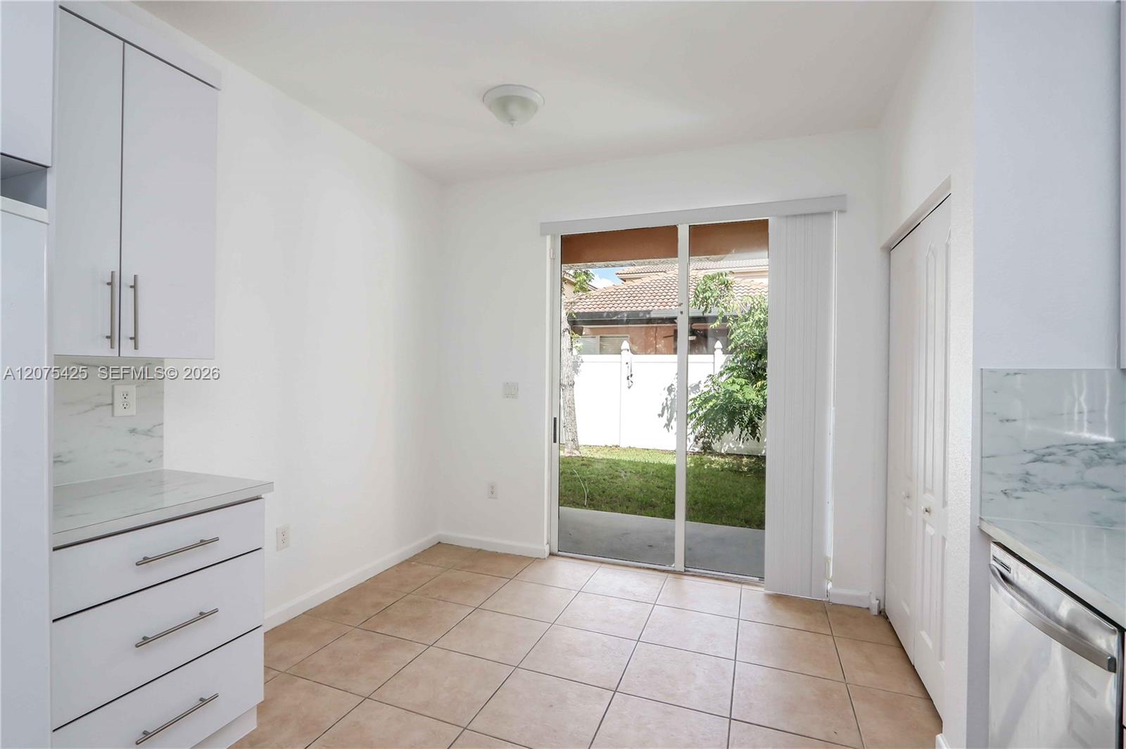 Bright and welcoming open-concept living space.