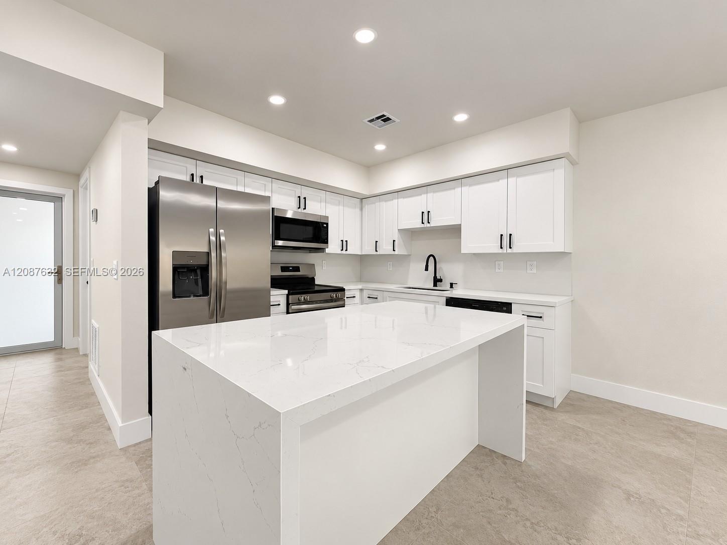7164 W 3rd Ave — Photo 3