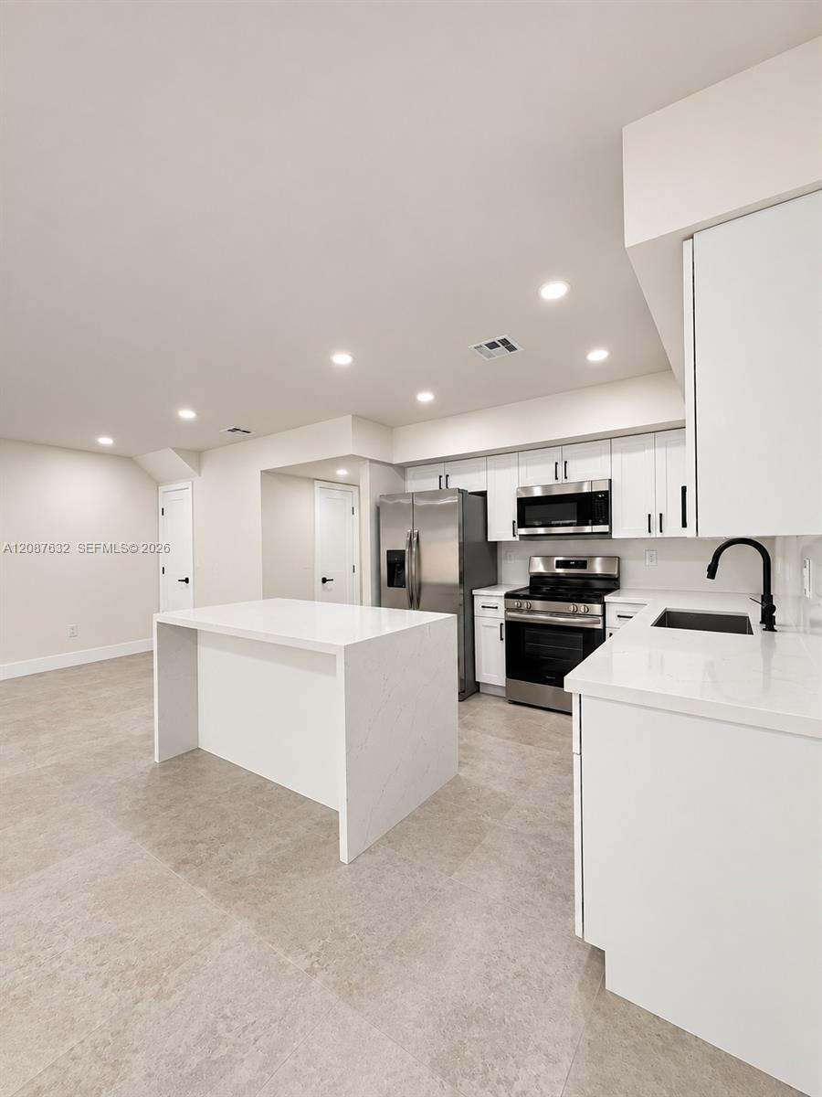 7164 W 3rd Ave — Photo 4