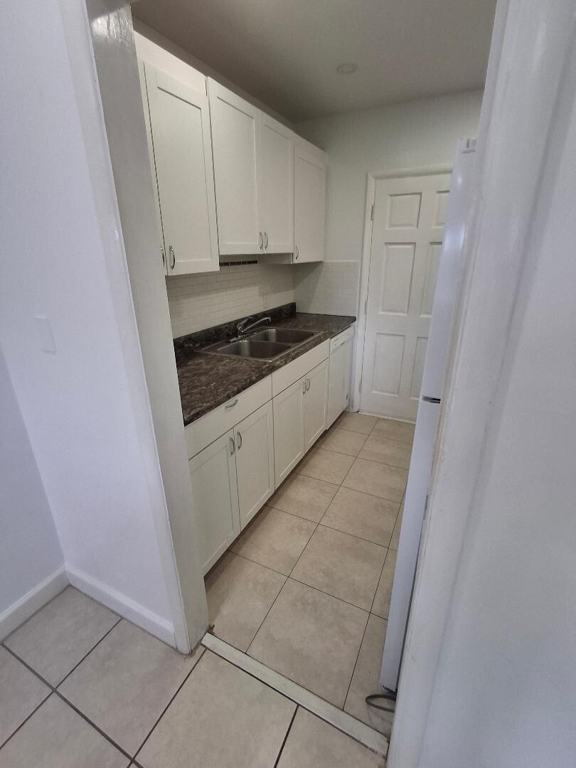 1250 E SAMPLE Road # 303 — Photo 5