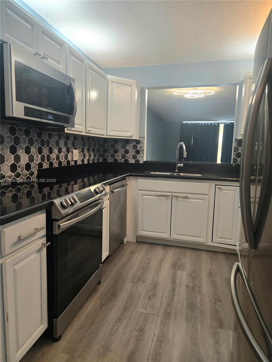 600 NW NW 214th St # 104, Miami Gardens FL 33169