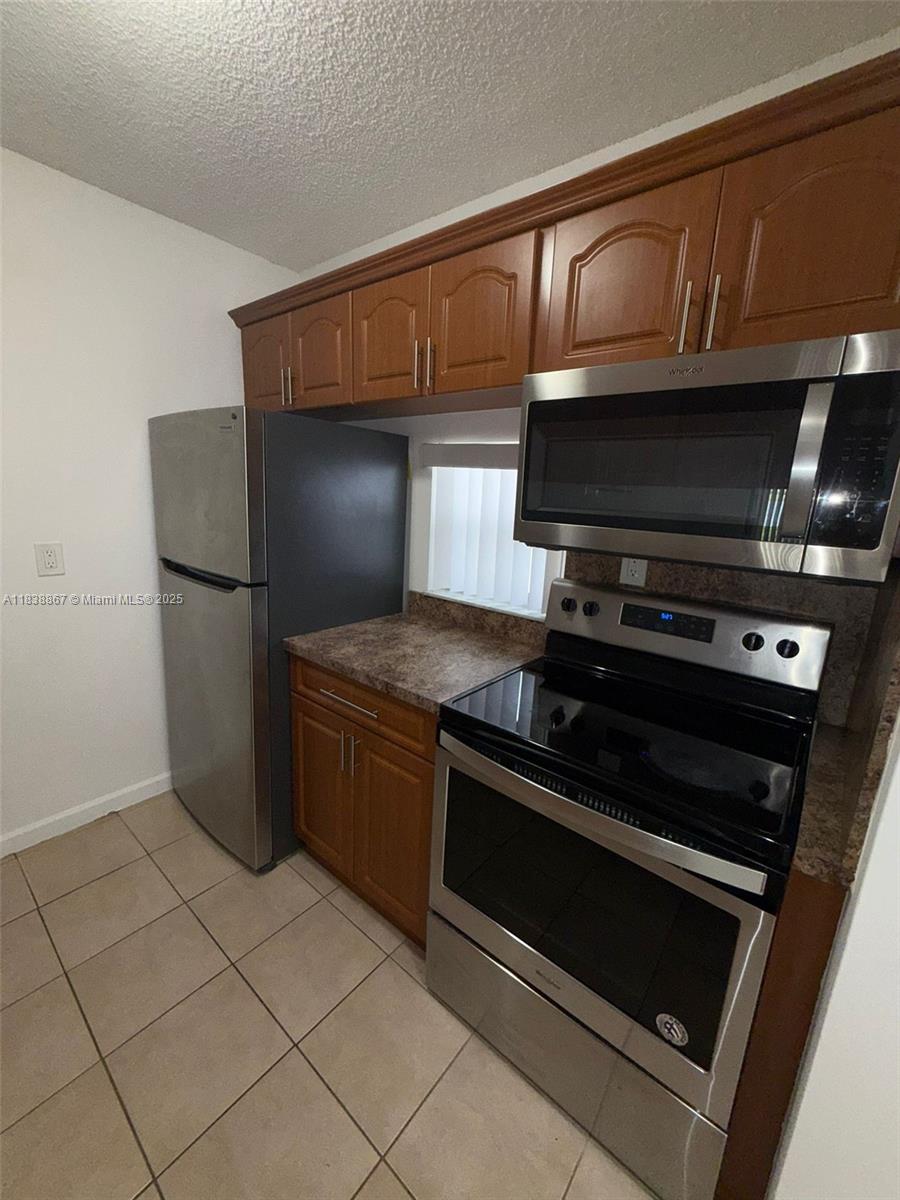 8560 N Sherman Cir # 105 — Photo 4