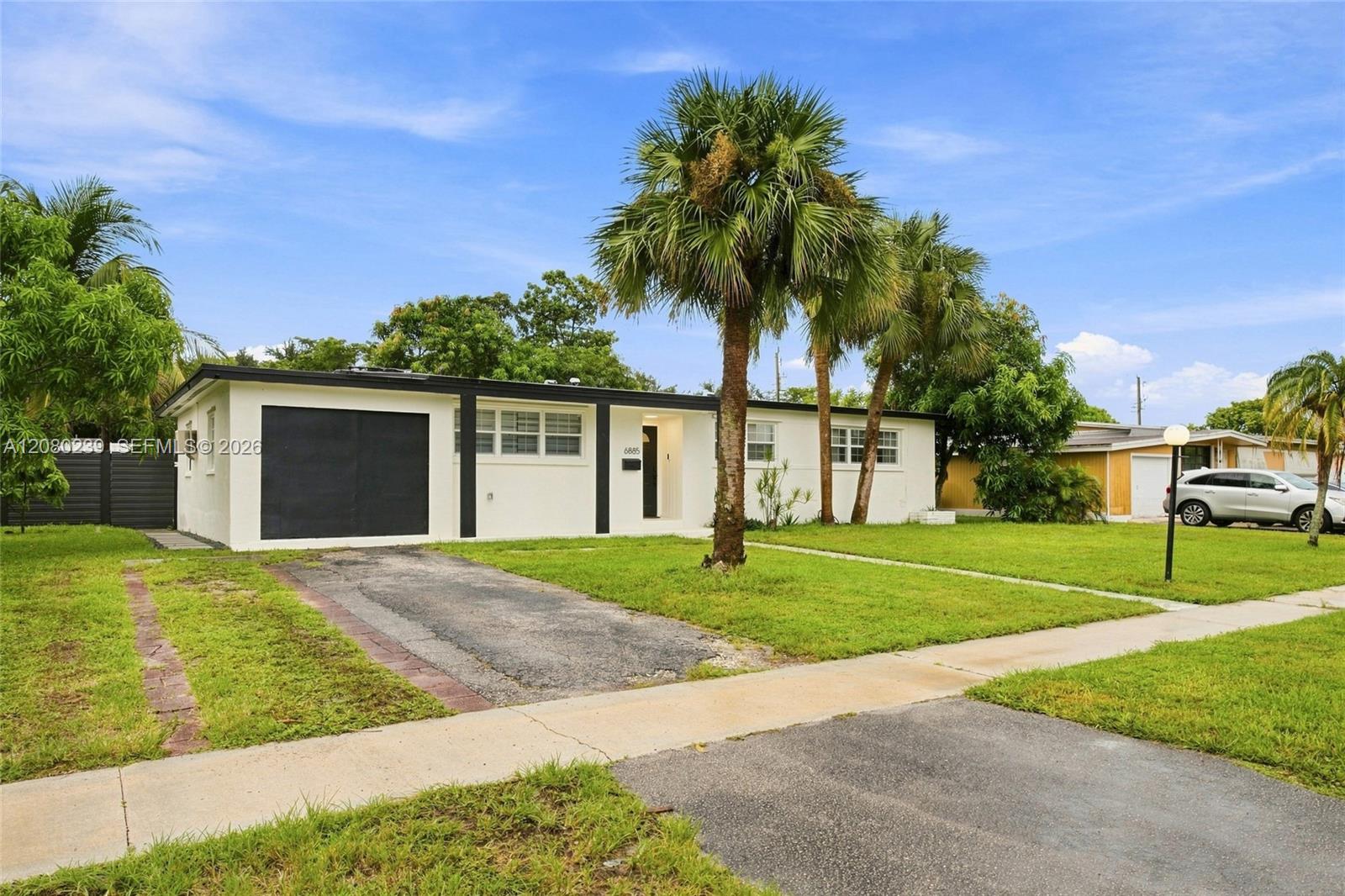 6885 NW 14th Ct — Photo 3