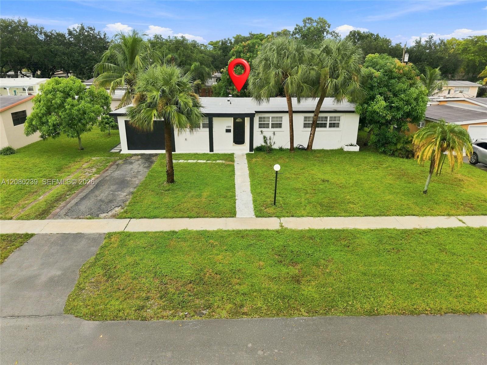 6885 NW 14th Ct — Photo 4