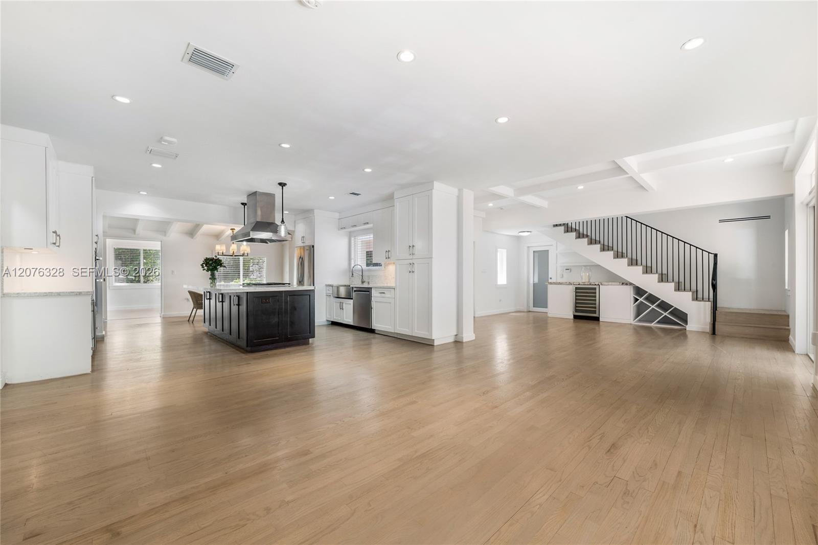 View from family room to Kitchen and Living room