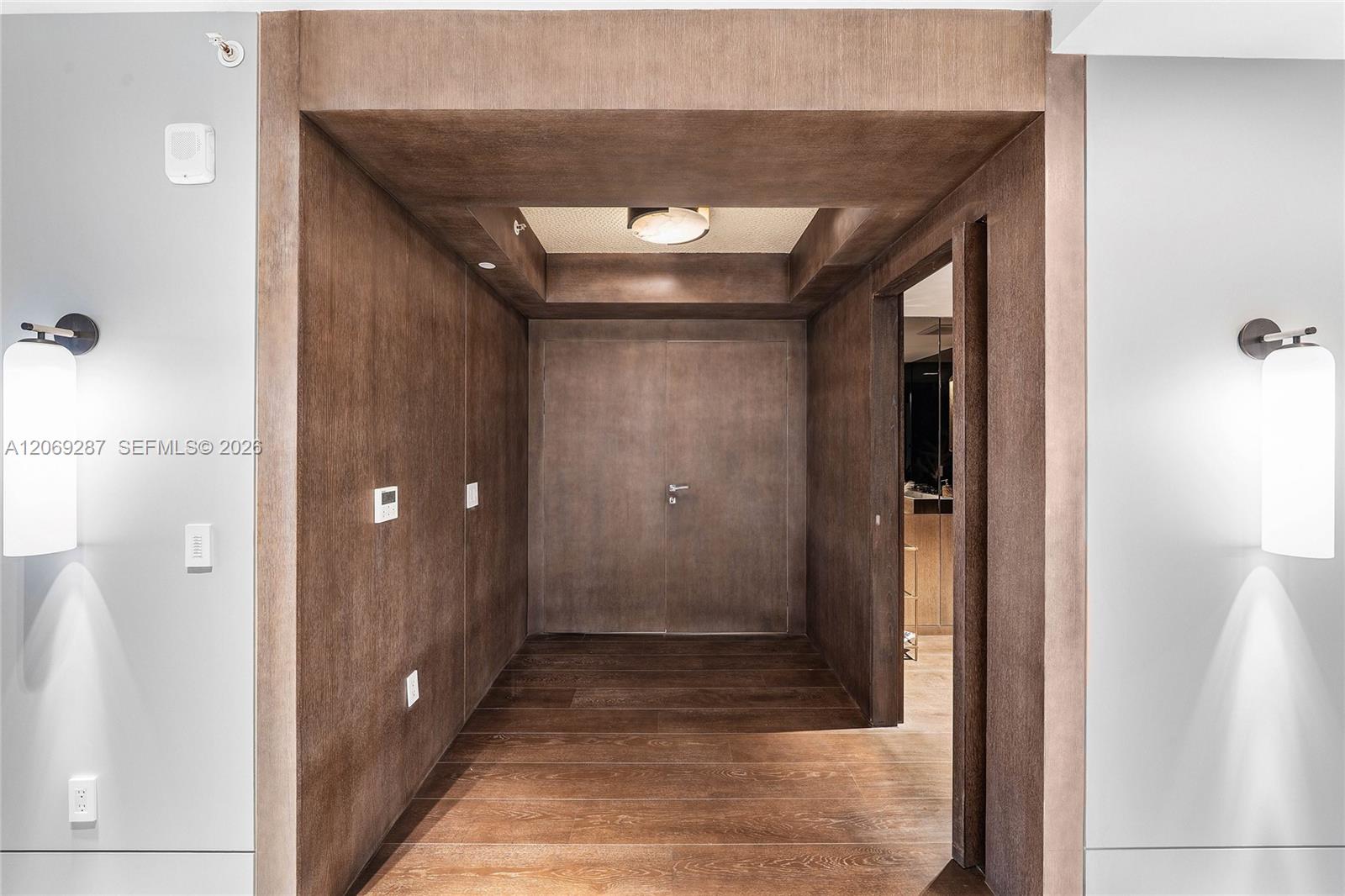 An elegant private elevator foyer provides a discreet and impressive arrival directly into the residence.