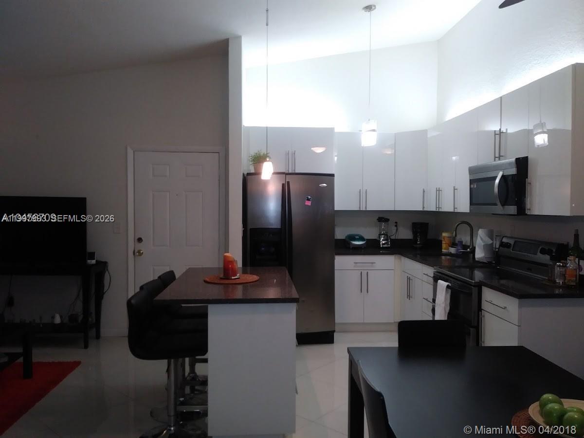 907 NE 199th St # 204 — Photo 5