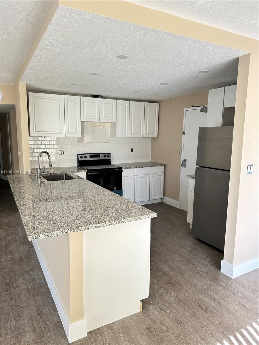 10777 W Sample Rd # 301 — Photo 2